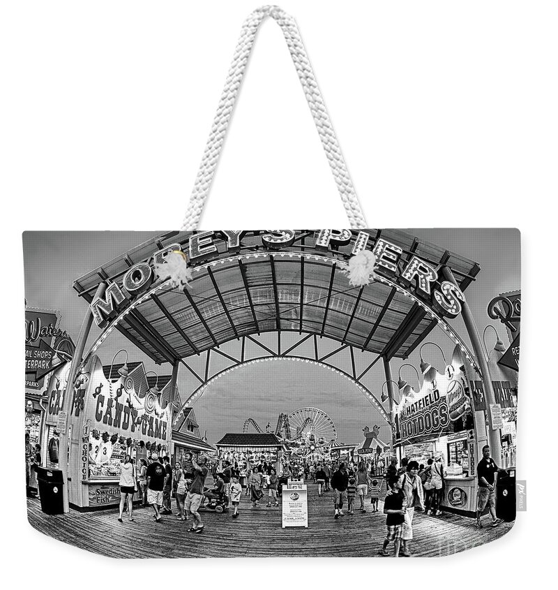 156 Foot Tall Weekender Tote Bag featuring the photograph Moreys Piers in Wildwood in black and white by Mark Miller