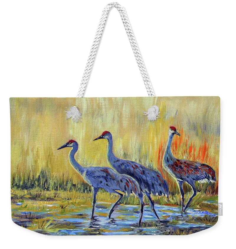 Sandhill Cranes Weekender Tote Bag featuring the painting Morning Light by Mishelle Tourtillott