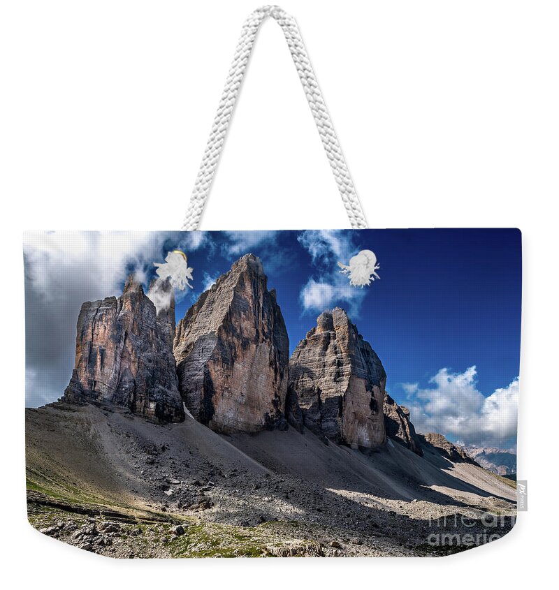 Alpine Weekender Tote Bag featuring the photograph Mountain Formation Tre Cime Di Lavaredo In The Dolomites Of South Tirol In Italy by Andreas Berthold