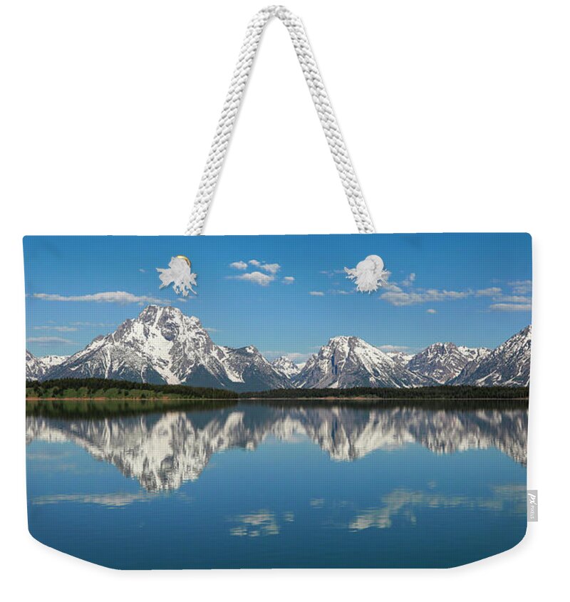 Grand Teton Reflection Panorama Weekender Tote Bag featuring the photograph Mountain Symmetry by Dan Sproul