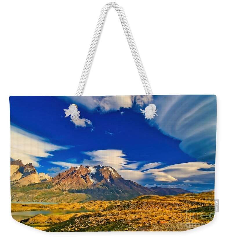 Lenticular Cloud Weekender Tote Bag featuring the photograph Mountains and Clouds in Patagonia by Bruce Block