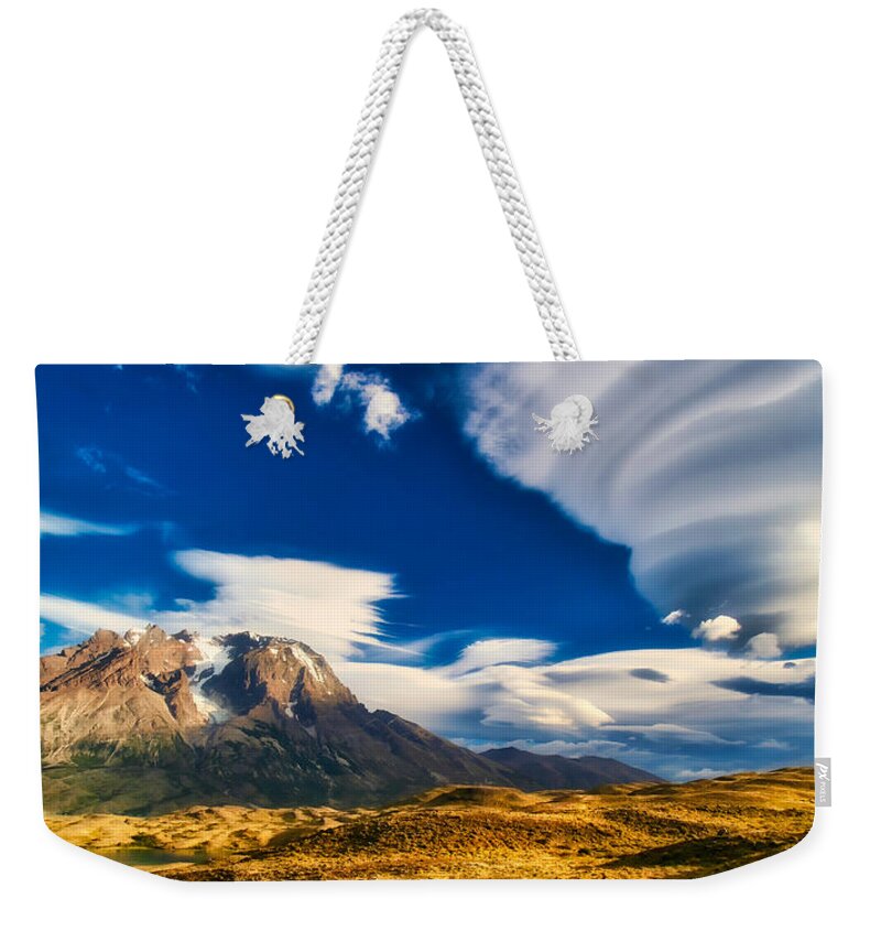 Lenticular Cloud Weekender Tote Bag featuring the photograph Mountains and Lenticular Cloud in Patagonia by Bruce Block