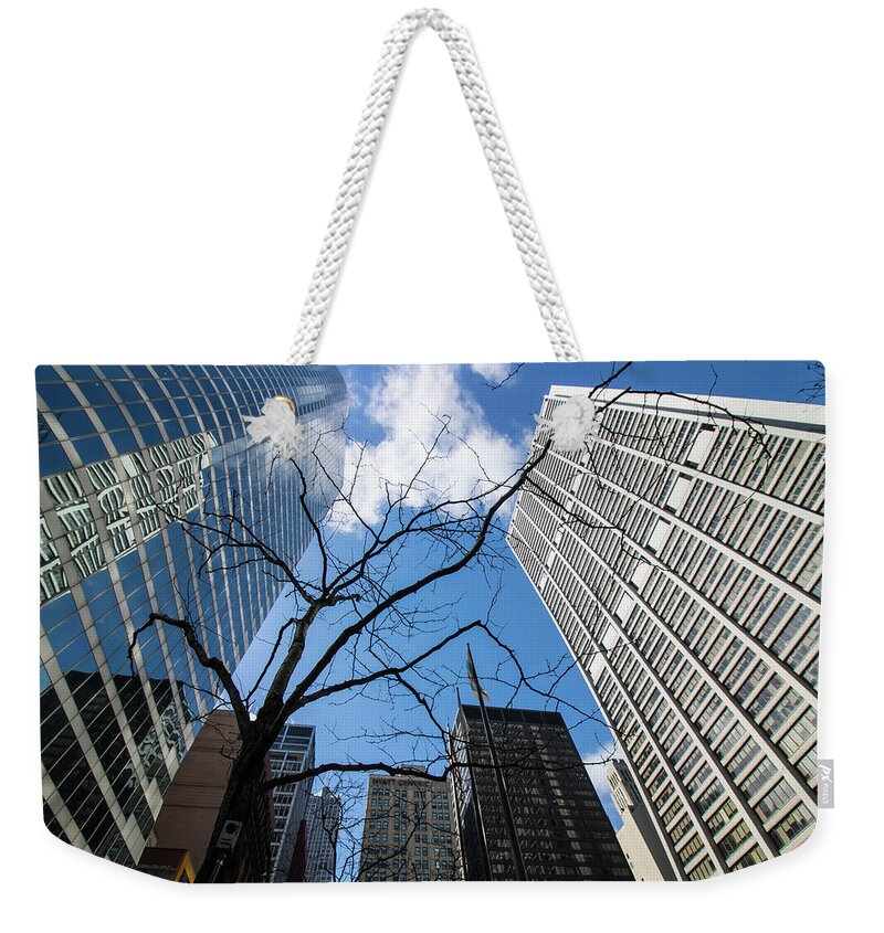 Tree Weekender Tote Bag featuring the photograph Nature and Skyscraper by Britten Adams