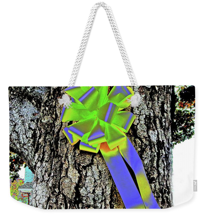 Neon Weekender Tote Bag featuring the photograph Neon Ribbon On Tree by Andrew Lawrence