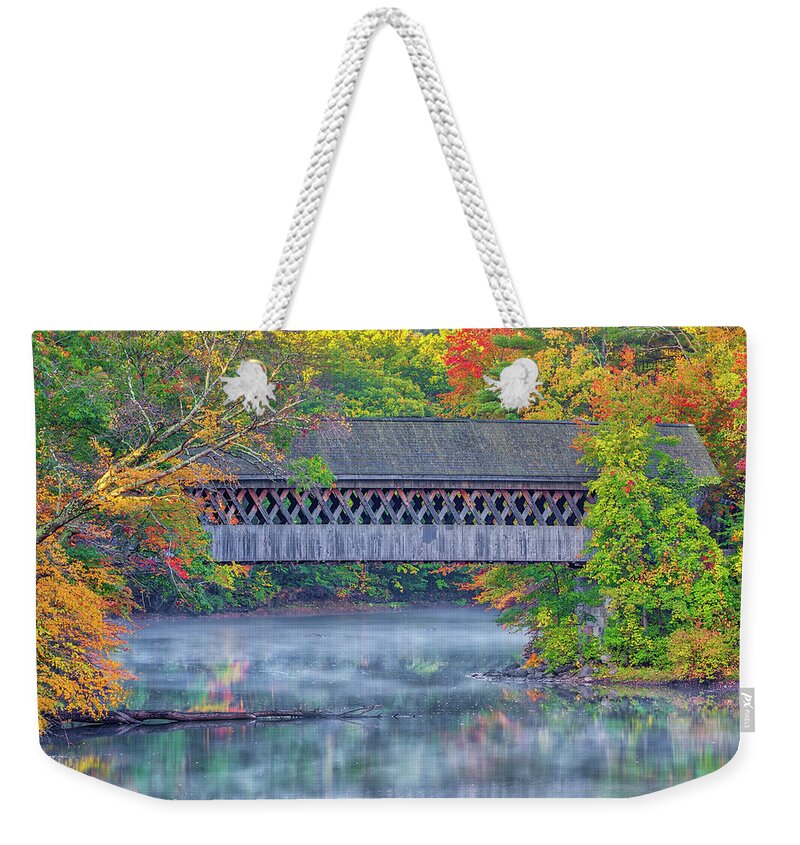 Henniker Covered Bridge Weekender Tote Bag featuring the photograph New England Fall Foliage at the Henniker Covered Bridge by Juergen Roth