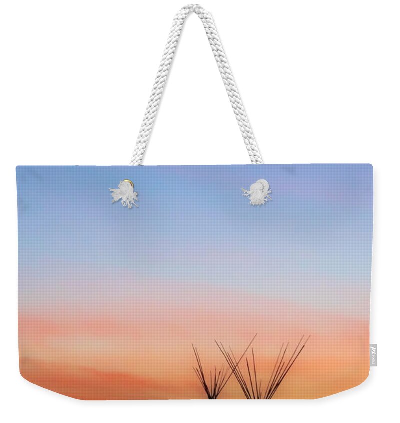 Taos Weekender Tote Bag featuring the photograph New Moon with Two Tipis by Elijah Rael