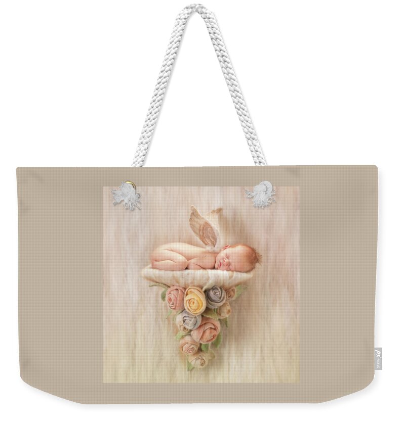 Angel Weekender Tote Bag featuring the photograph Newborn Angel with Roses by Anne Geddes
