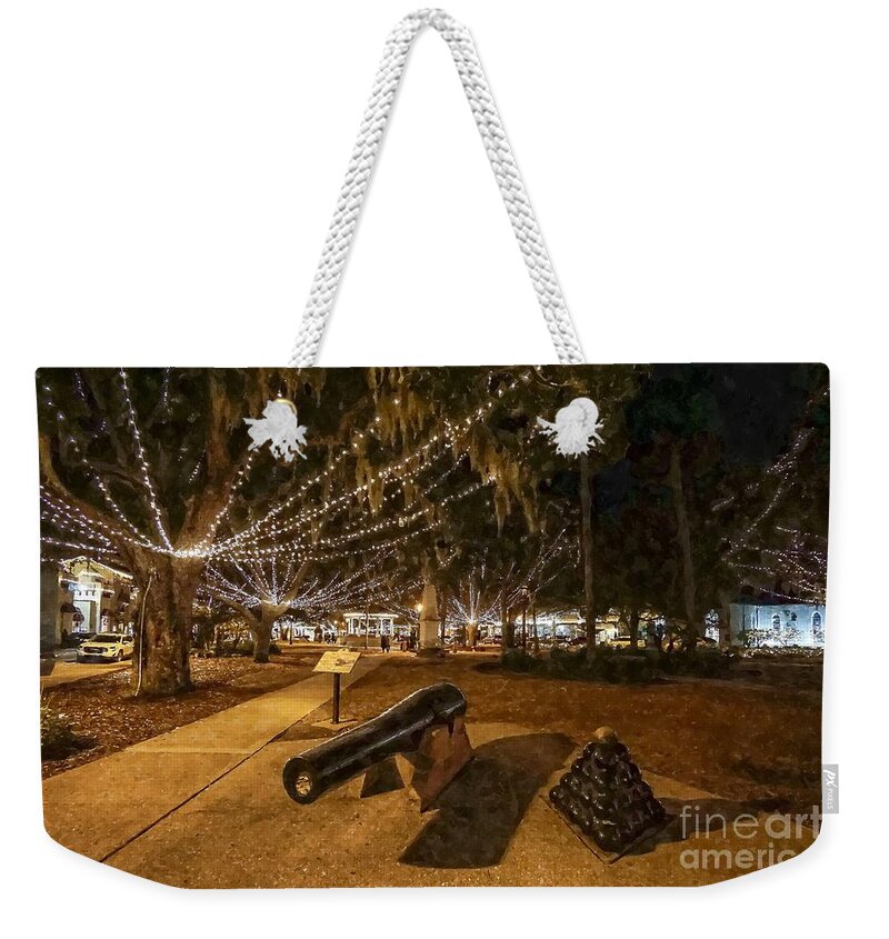 Florida Weekender Tote Bag featuring the photograph Night street scene on St George Street in the downtown historic district in St Augustine, Florida US by William Kuta