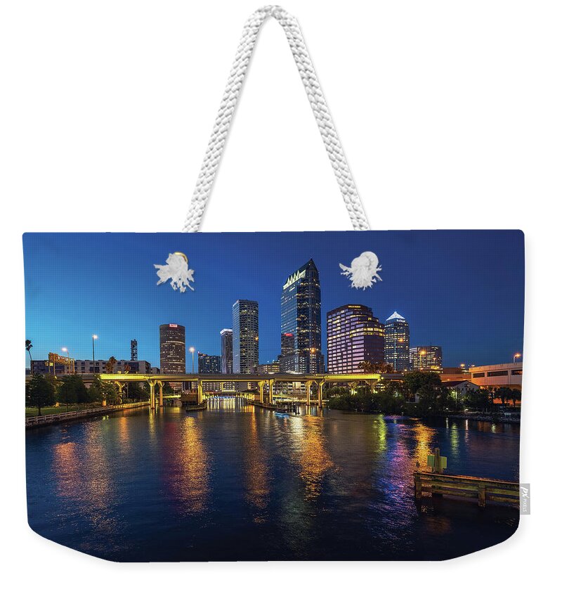 Brorein Bridge Weekender Tote Bag featuring the photograph Nightfall over Tampa Skyline and Hillsborough River by Kim Seng