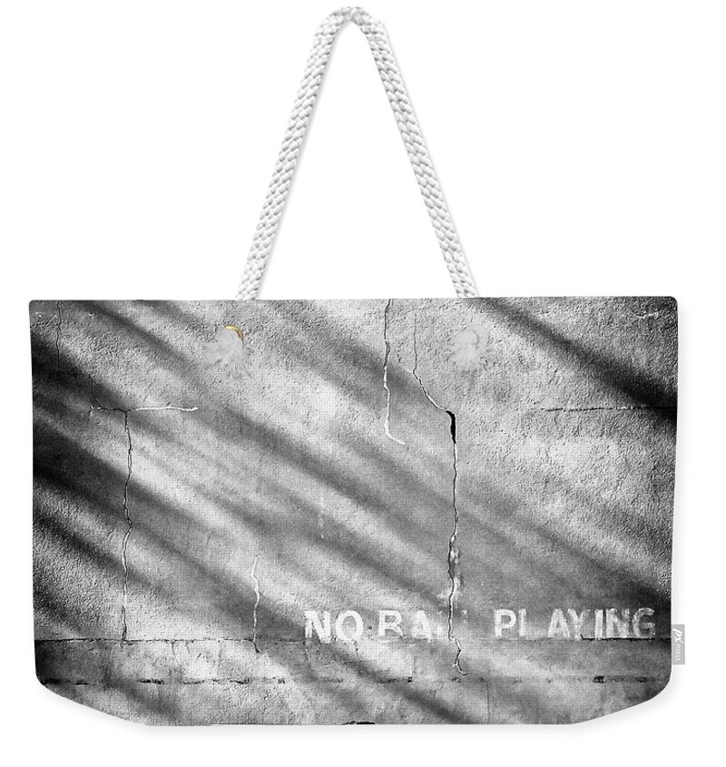  Weekender Tote Bag featuring the photograph No Ball Playing by Steve Stanger