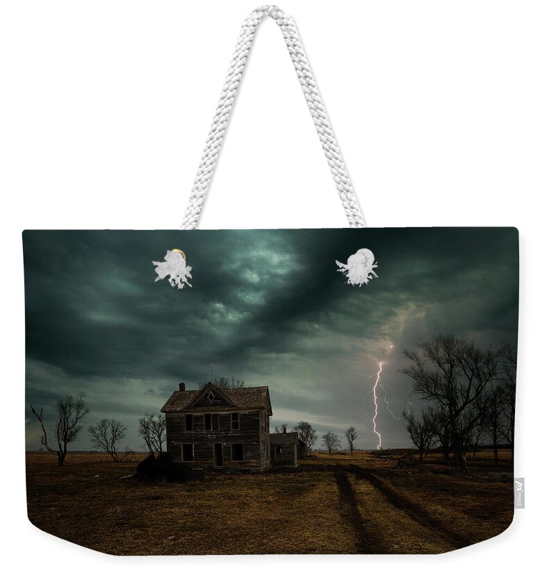 Lightning Weekender Tote Bag featuring the photograph No One's There by Aaron J Groen