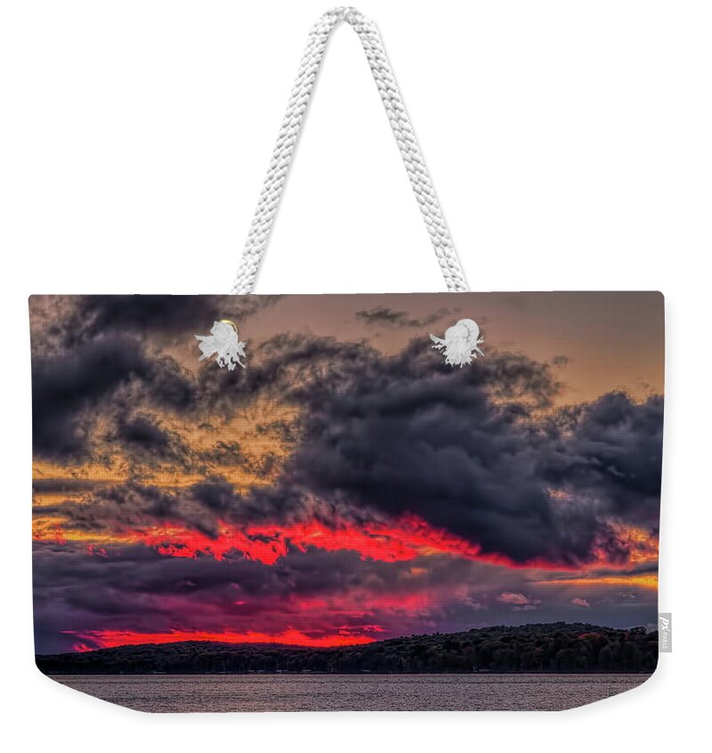 Upnorth Weekender Tote Bag featuring the photograph North Twin Lake Red Glow Sunset by Dale Kauzlaric
