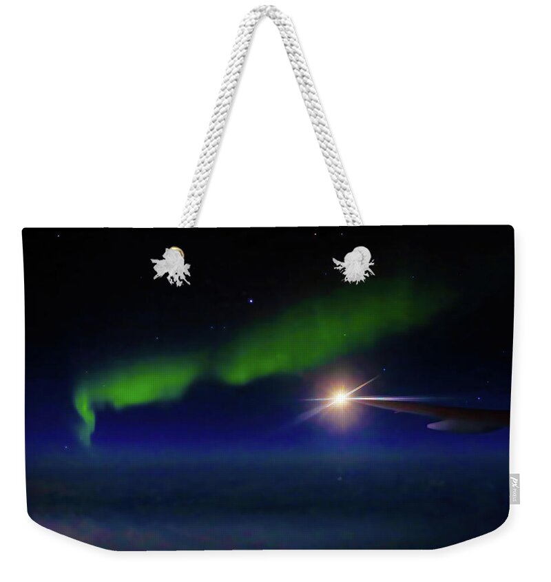 Northern Lights Weekender Tote Bag featuring the photograph Northern Lights over the Bering Strait by Shixing Wen