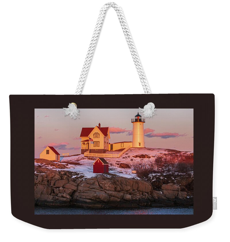 Light Weekender Tote Bag featuring the photograph Nubble Light at Sunset by Paul Mangold