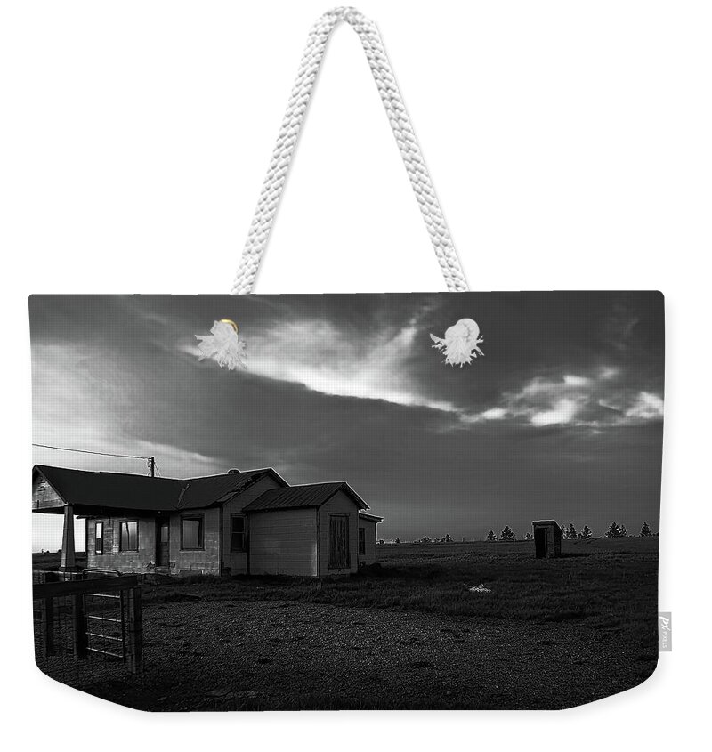 Abandoned Wyoming Weekender Tote Bag featuring the photograph Old Abandoned Store Wyoming BW by Cathy Anderson