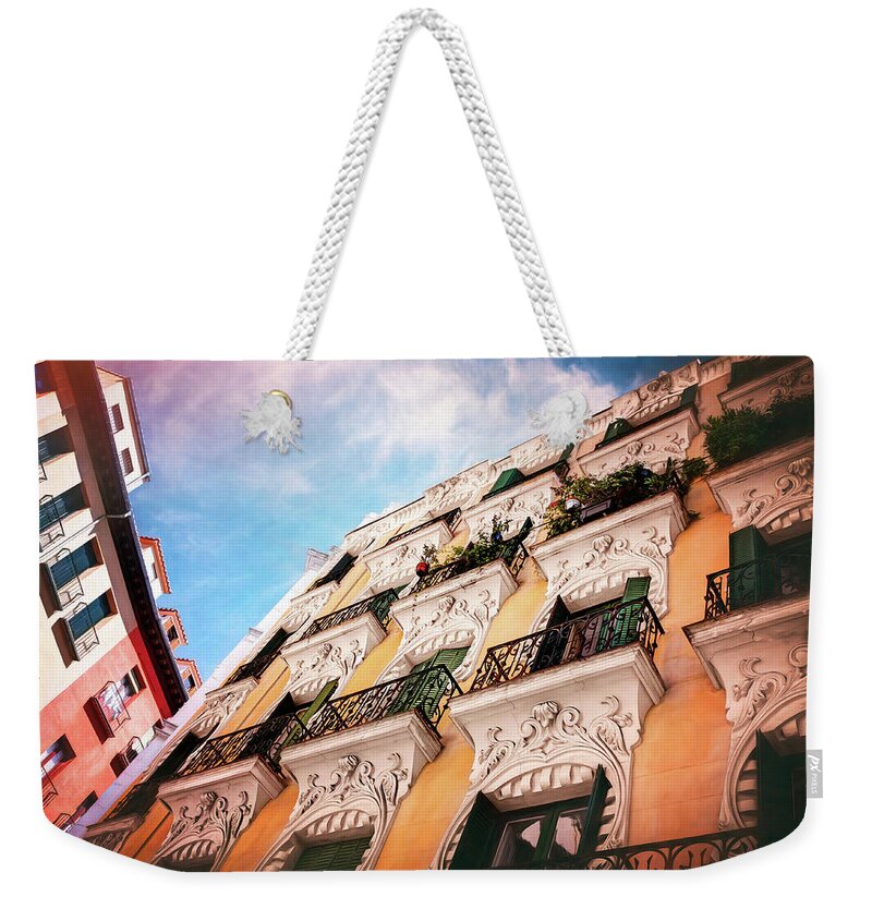 Madrid Weekender Tote Bag featuring the photograph Old and New Architecture of Madrid Spain by Carol Japp