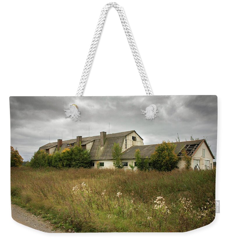 Lithuania Weekender Tote Bag featuring the photograph Old Barn Siauliai Lithuania by Mary Lee Dereske