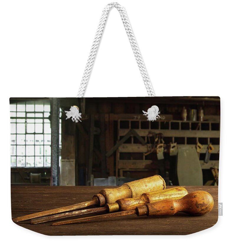 Chisel Weekender Tote Bag featuring the photograph Old chisels by Average Images