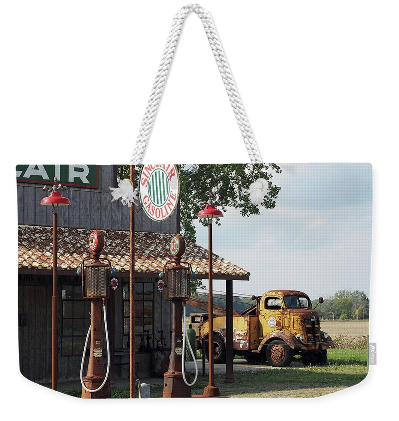 Vintage Weekender Tote Bag featuring the photograph Old Gas Station by Bill Swartwout