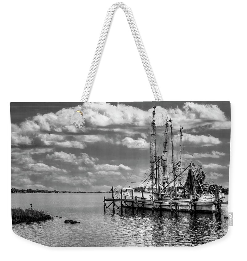 Boats Weekender Tote Bag featuring the photograph Old Shrimp Boats in the Harbor Black and White by Debra and Dave Vanderlaan