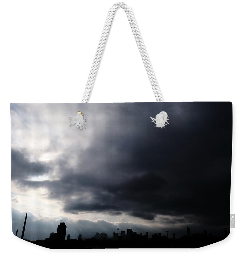 City Weekender Tote Bag featuring the photograph Ominous by Kreddible Trout