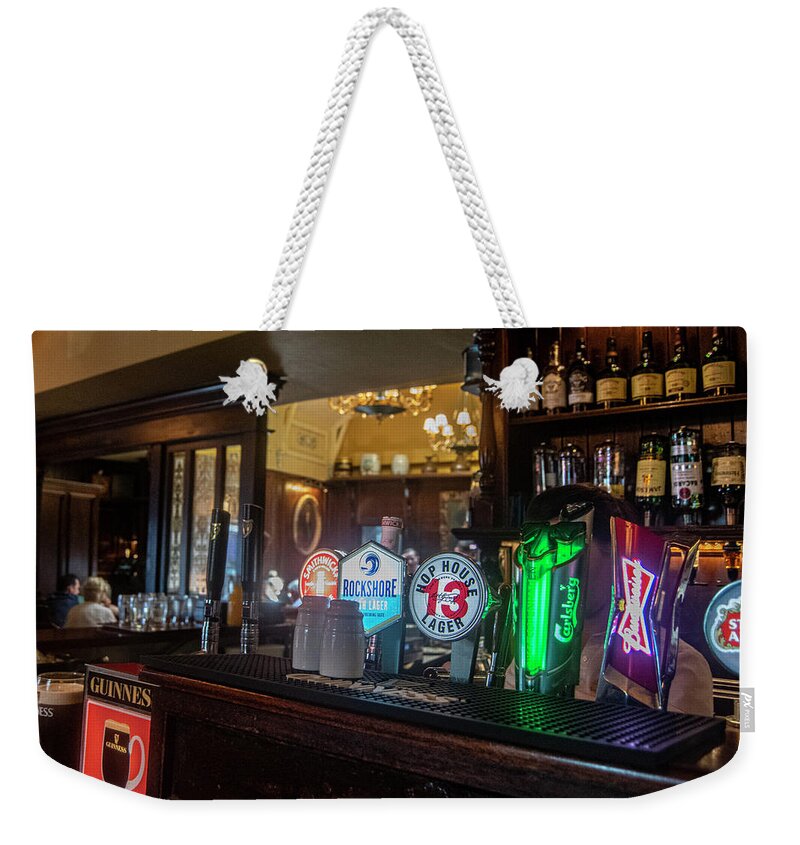 Irish Pub Weekender Tote Bag featuring the photograph On Tap by Edward Shmunes