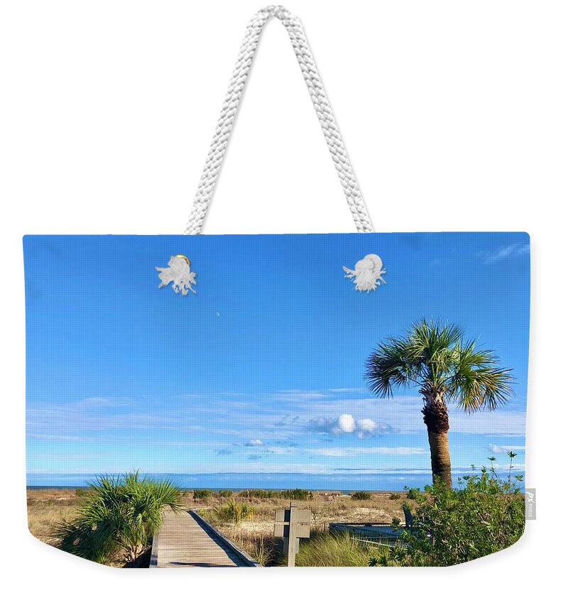 Boardwalk Weekender Tote Bag featuring the photograph On the Boardwalk by Michael Stothard