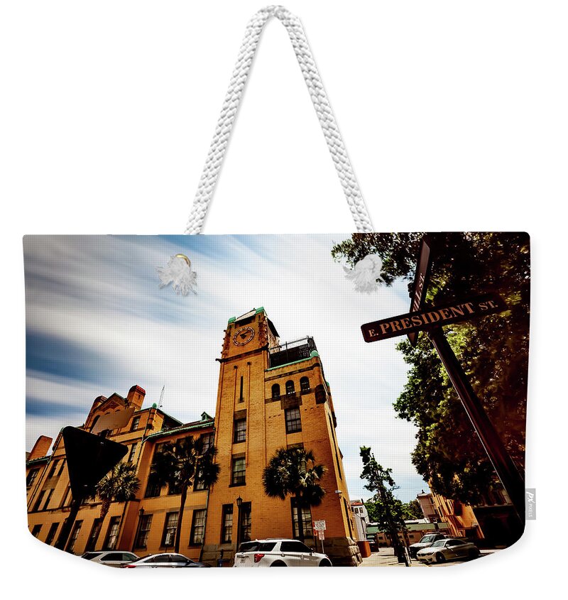 Savannah Weekender Tote Bag featuring the photograph On the corner of E.President and Bull st by Kenny Thomas