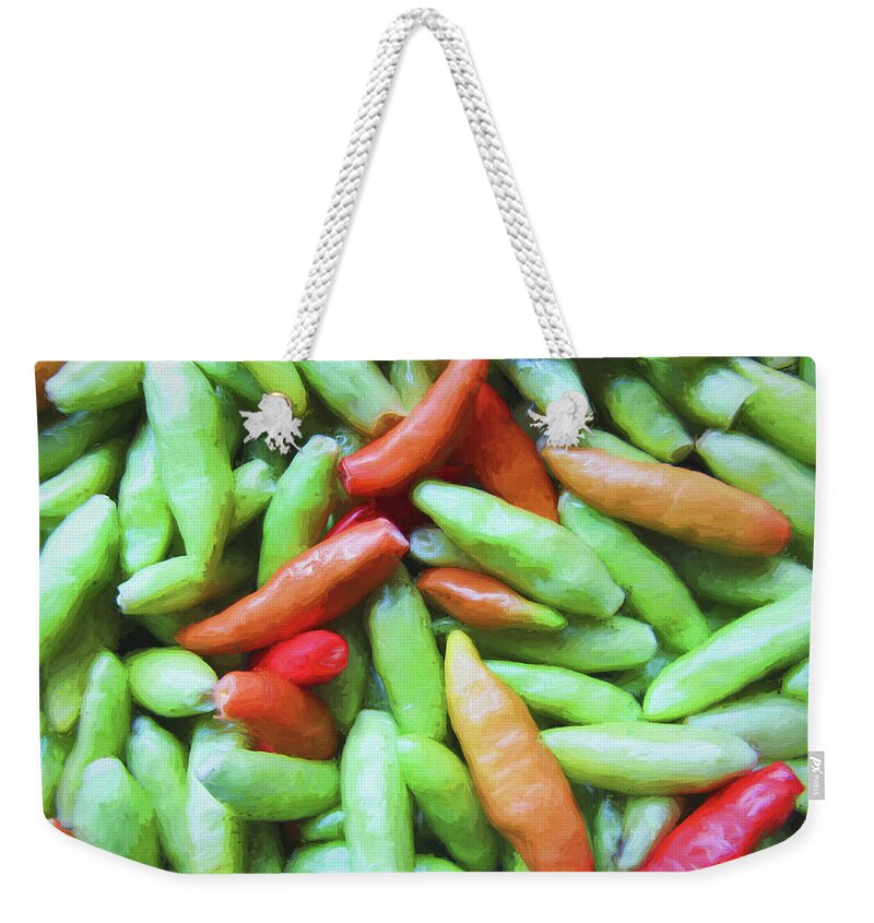 Red Weekender Tote Bag featuring the photograph Orange Red and Green Tabasco Peppers by Kathy Clark