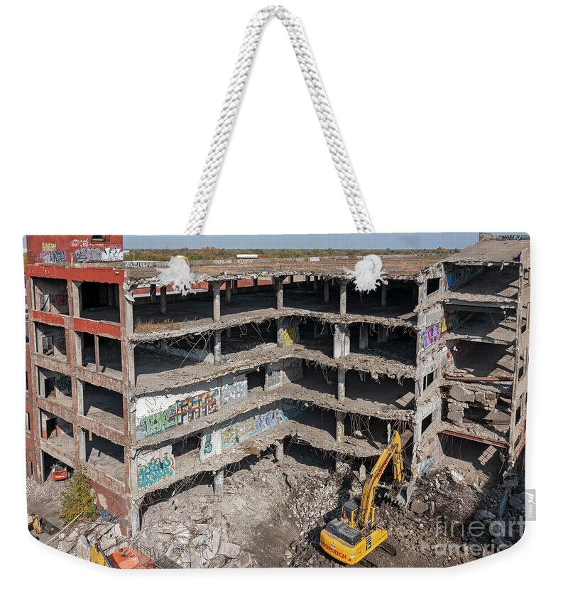 Packard Weekender Tote Bag featuring the photograph Packard Plant Demolition by Jim West