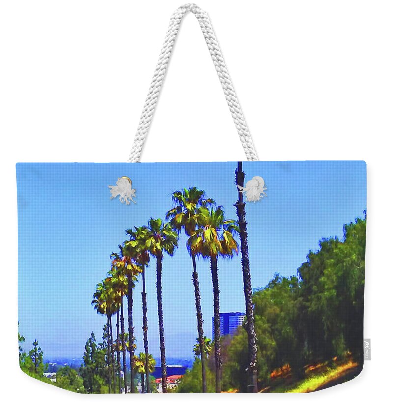 Palm Trees Weekender Tote Bag featuring the photograph Palm Tree Road by Andrew Lawrence