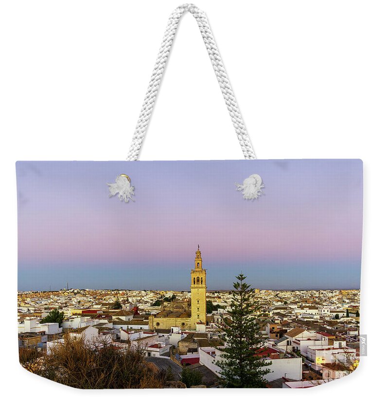 Spiritual Weekender Tote Bag featuring the photograph Panoramic View of Lebrija in the Spanish Province of Seville Blue Hour by Pablo Avanzini