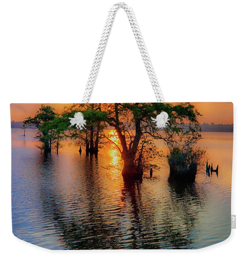 North Carolina Weekender Tote Bag featuring the photograph Pasquetank Sunrise by Dan Carmichael