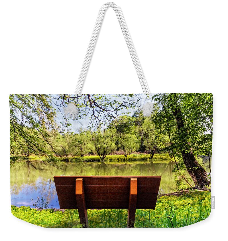 Carolina Weekender Tote Bag featuring the photograph Peaceful Morning on the Edge of the River by Debra and Dave Vanderlaan