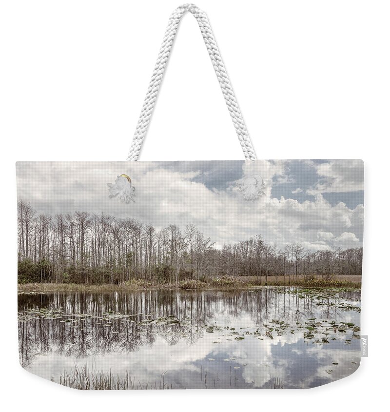 Clouds Weekender Tote Bag featuring the photograph Peaceful Soft Reflections on the Everglades by Debra and Dave Vanderlaan