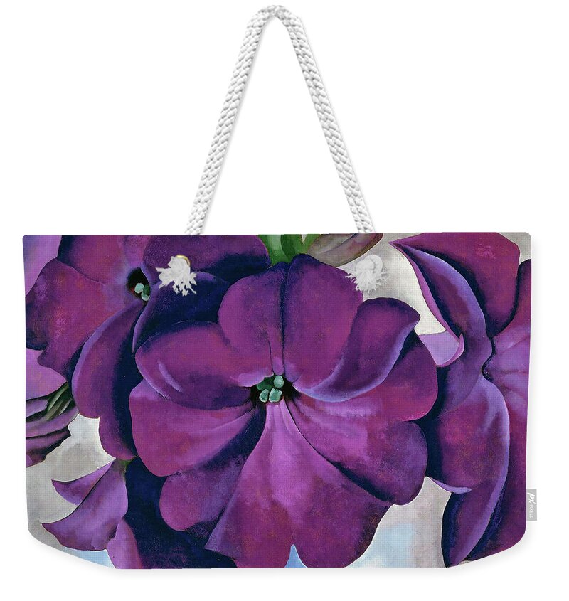Georgia O'keeffe Weekender Tote Bag featuring the painting Petunias - Modernist purple flower painting by Georgia O'Keeffe