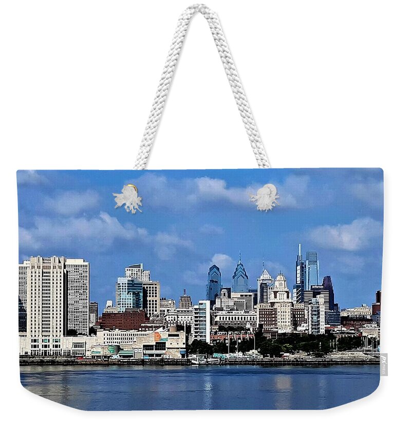 Philadelphia Weekender Tote Bag featuring the photograph Philadelphia Skyline across the Delaware River from the Aquarium in Camden, New Jersey by Linda Stern