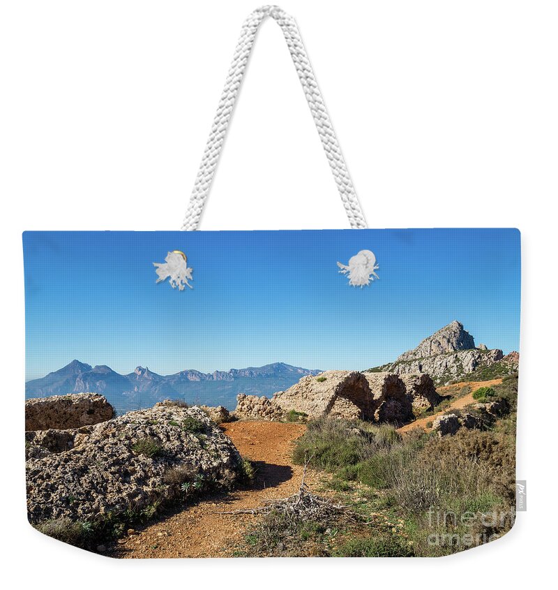 Mountain Landscape Weekender Tote Bag featuring the photograph Picturesque ruins of a fortress by Adriana Mueller