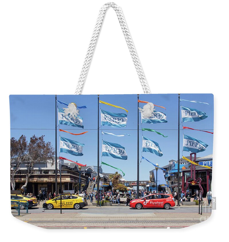 Wingsdomain Weekender Tote Bag featuring the photograph Pier 39 Flags San Francisco California 0F7A3294 by Wingsdomain Art and Photography