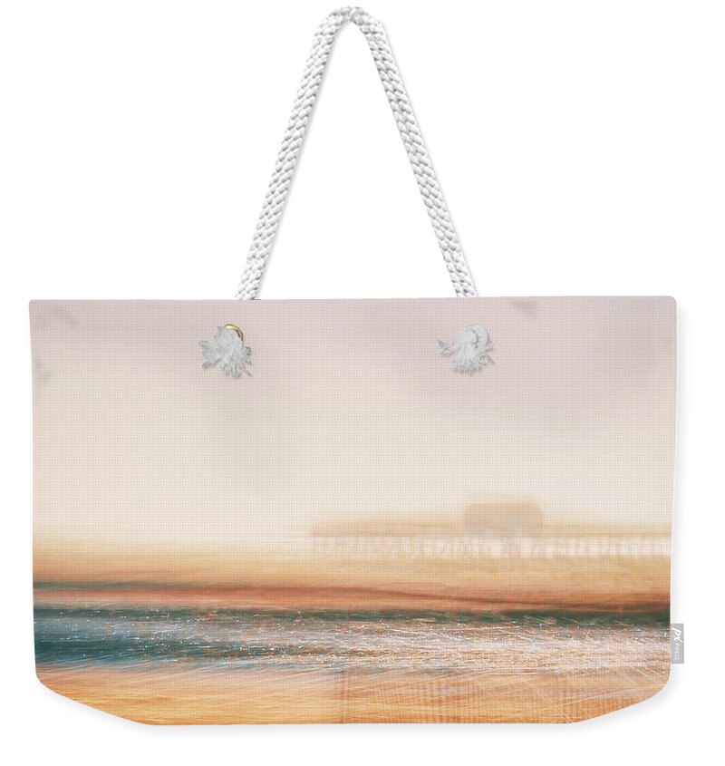  Weekender Tote Bag featuring the photograph Pier by Steve Stanger