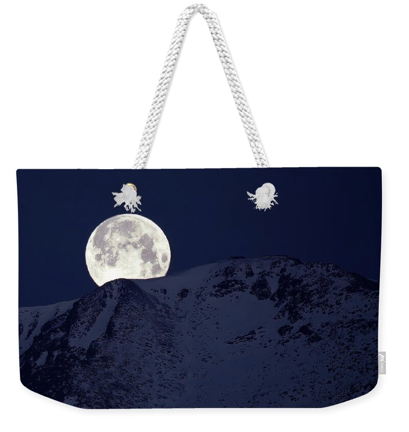 Moon Weekender Tote Bag featuring the photograph Pikes Peak Moonset by Bob Falcone