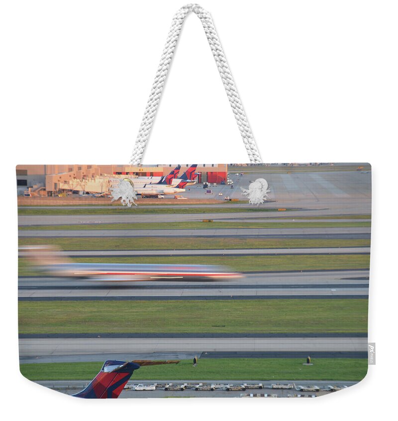 Plane Weekender Tote Bag featuring the photograph Plane in motion by Dmdcreative Photography