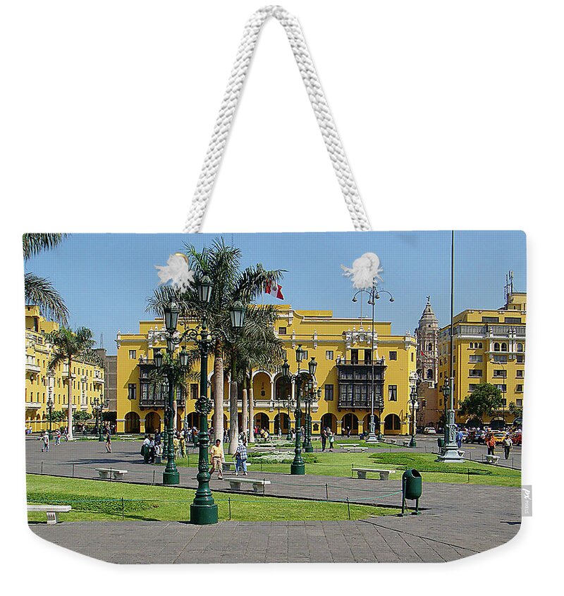 Yellow Buildings Weekender Tote Bag featuring the photograph Plaza Mayor Lima Peru by Karen Zuk Rosenblatt
