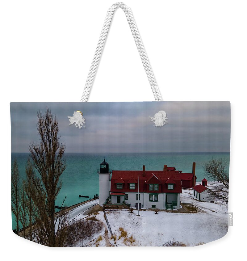 Lighthouse Lake Michigan Weekender Tote Bag featuring the photograph Point Betsie Lighthouse side view by Eldon McGraw