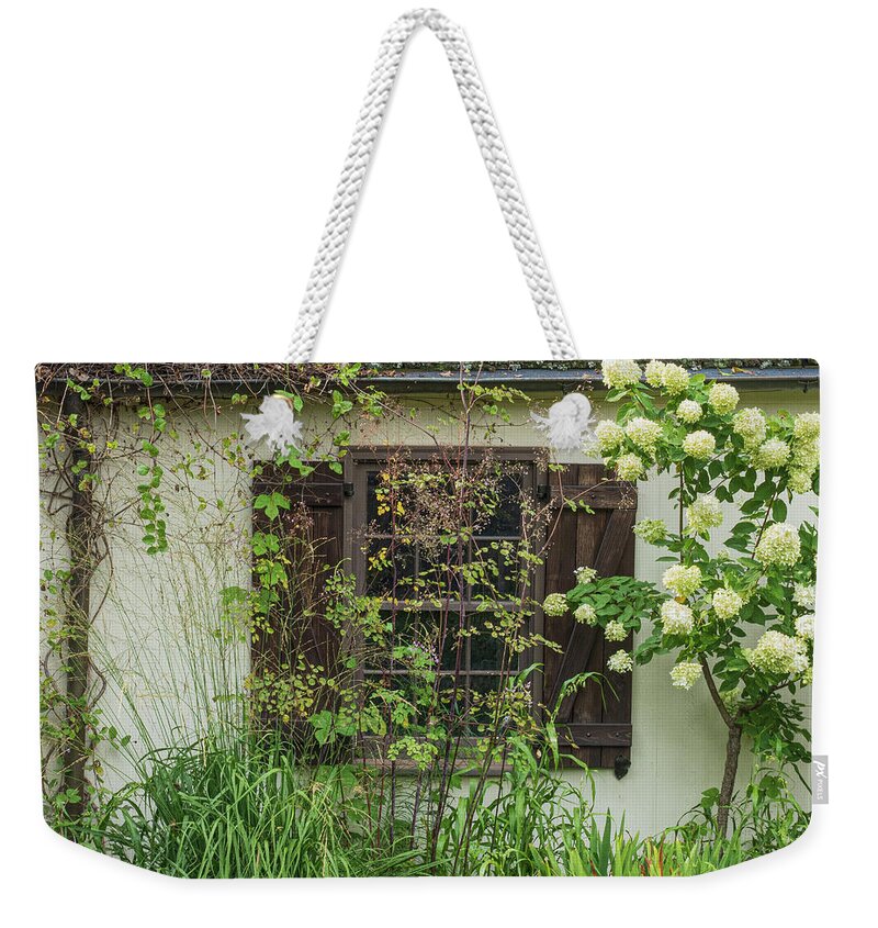 Architecture Weekender Tote Bag featuring the photograph Potting Shed Window at Chanticleer by Kristia Adams