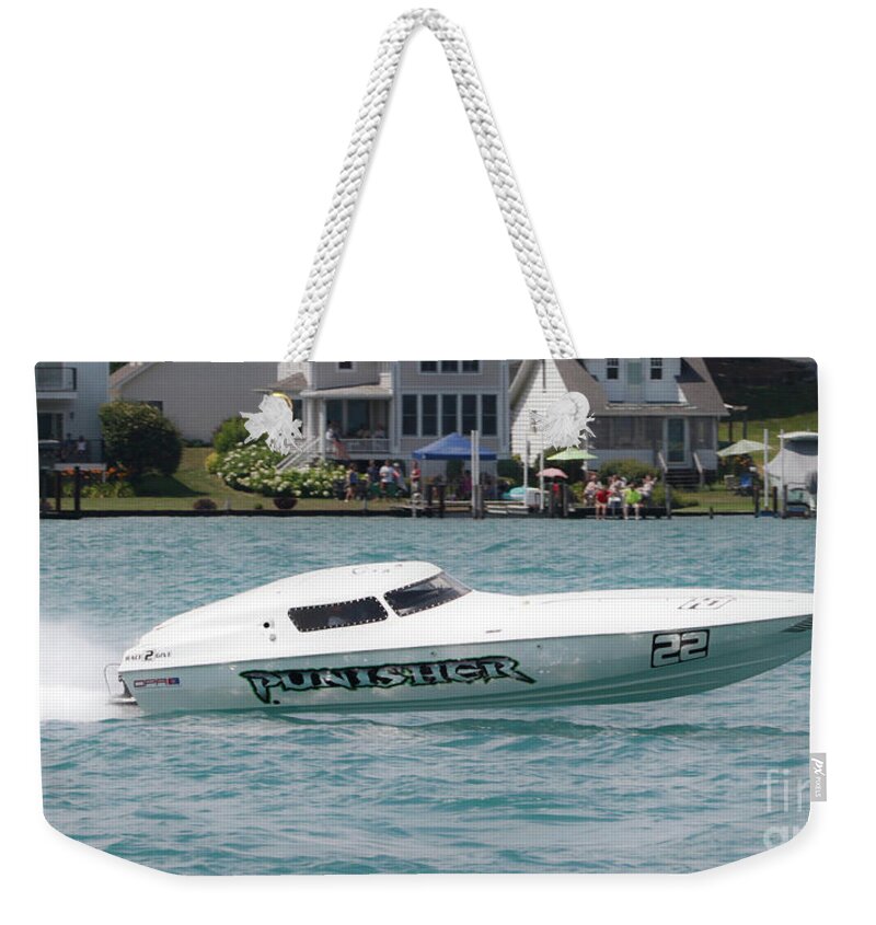 Punisher Weekender Tote Bag featuring the photograph Punisher by Michael Petrick