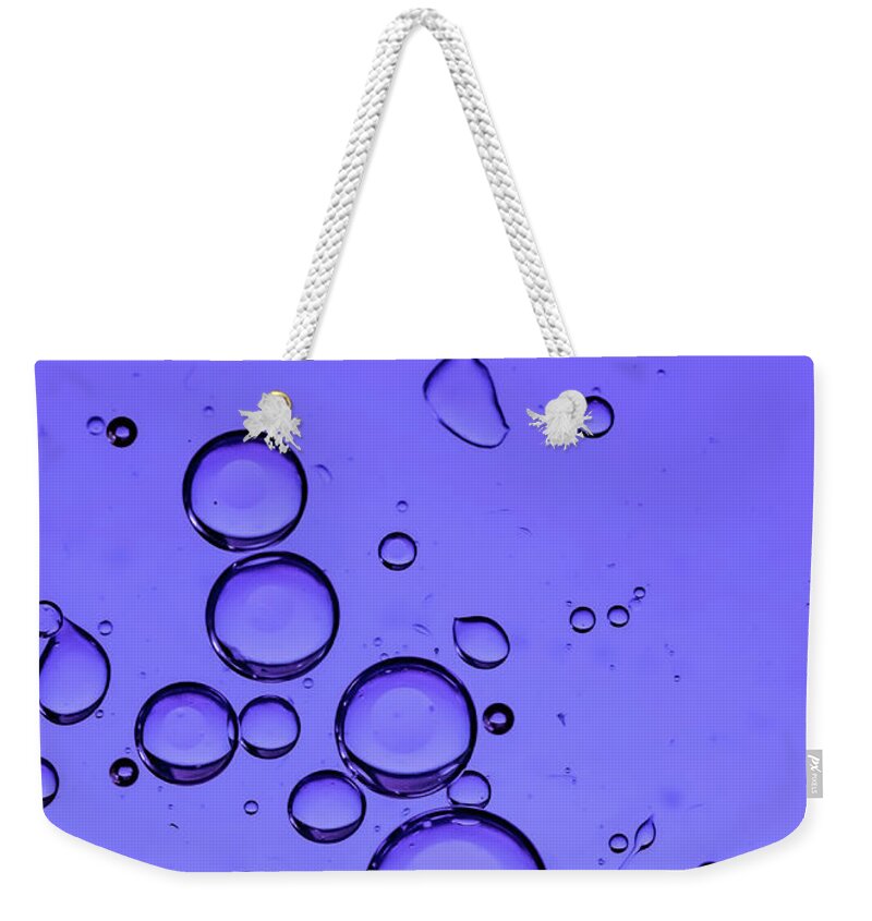 Abstract Weekender Tote Bag featuring the photograph Purple Bubbles by Cathy Kovarik