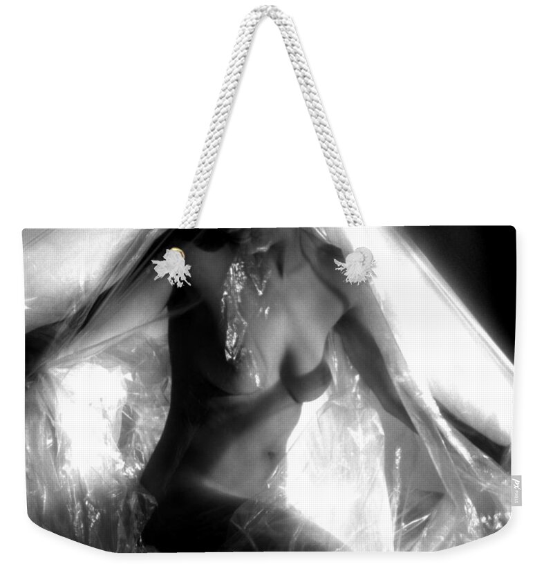 Photography Weekender Tote Bag featuring the photograph Pushing Through by Frederic A Reinecke