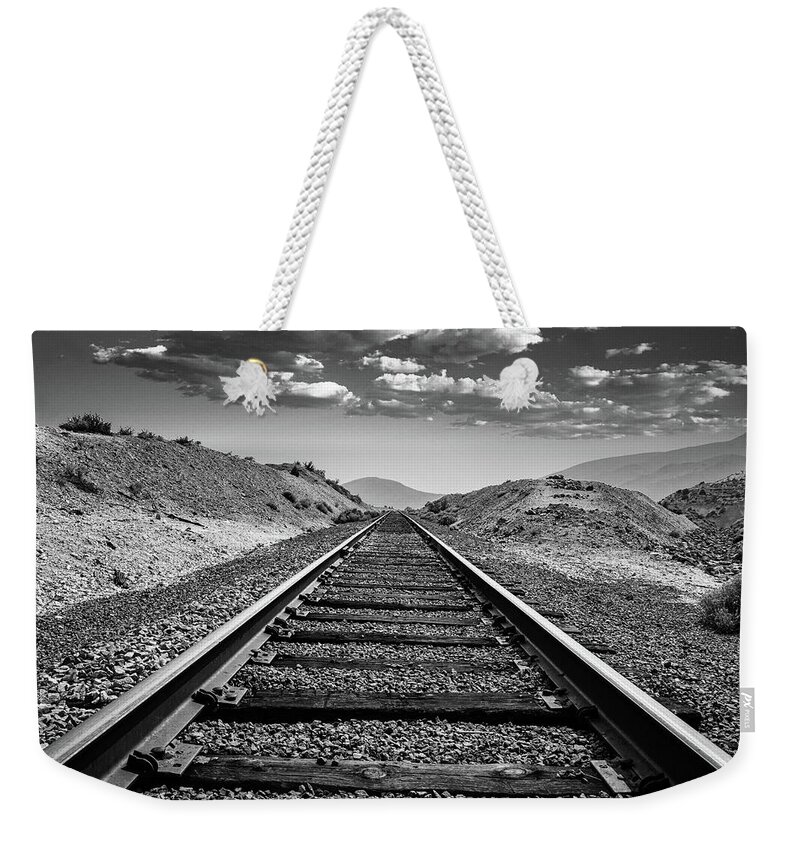 Gold Hill Weekender Tote Bag featuring the photograph Rail to Infinity Black and White by Ron Long Ltd Photography