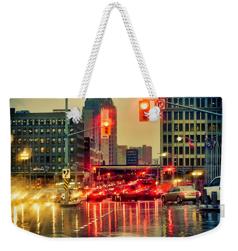 Rainy Day Weekender Tote Bag featuring the photograph Rainy day in Ottawa by Tatiana Travelways